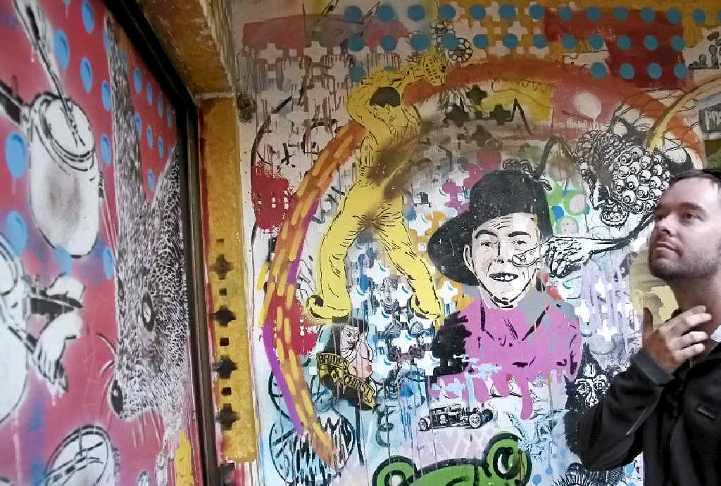 STREET ART: Adrian White of Gladstone marvelling at the intricacies of the art work on the streets of Buenos Aires. STREET ART: Adrian White of Gladstone marvelling at the intricacies of the art work on the streets of Buenos Aires.